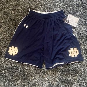 - Under Armour women’s NCAA Notre Dame Basketball reversible shorts